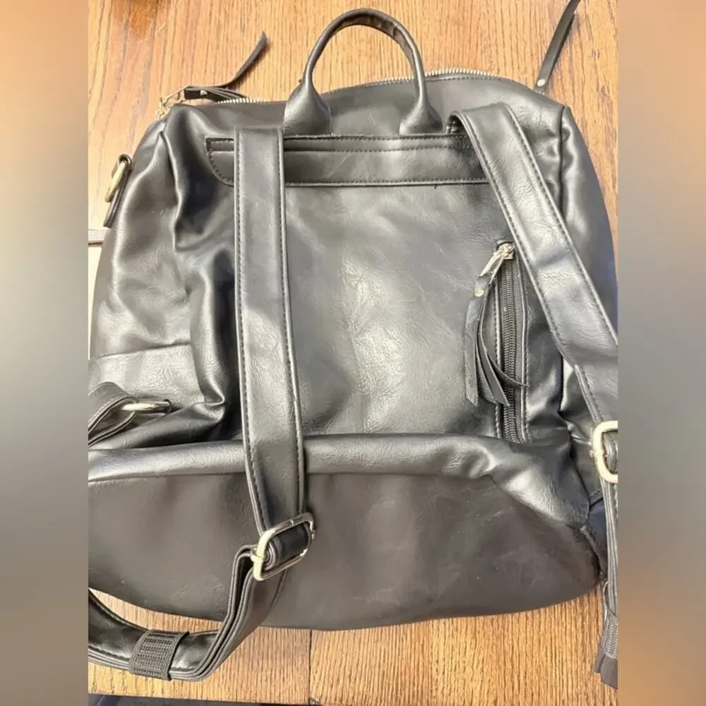 Black Leather Modern + Chic Bag backpack EUC. Lined w/purple. Looks New!